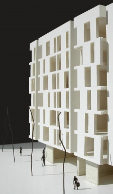 Edificio 24 viviendas, locales y aparcamiento entre medianeras